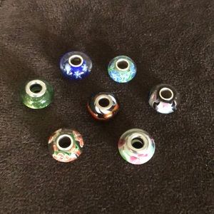 7 glass bead charms